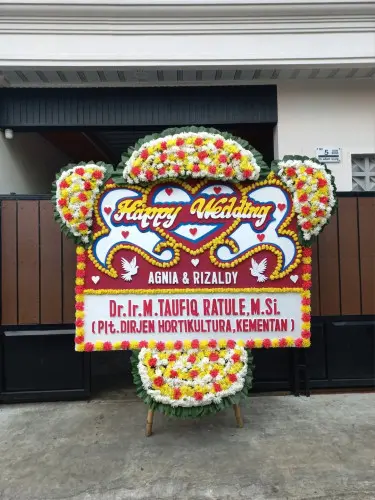 Papan Bunga Pernikahan jurumudi baru